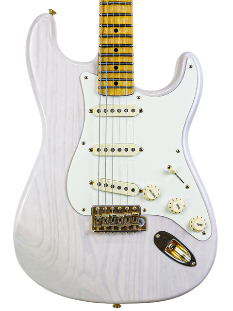A white electric guitar with a maple neck isolated on a white background.