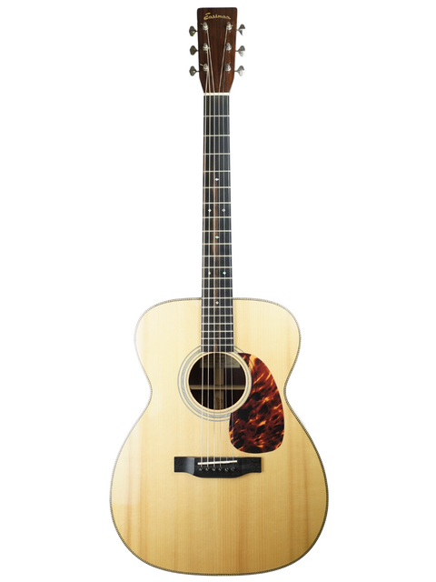 An acoustic guitar with a natural finish and a tortoiseshell pickguard.