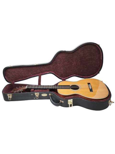 An open wooden guitar case revealing a Martin 0-28VS guitar, highlighting its classic style and American craftsmanship from 2011.
