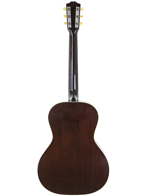 Back view of a Gibson 30s L-00 True Vintage acoustic guitar, showcasing its elegant wooden back design.