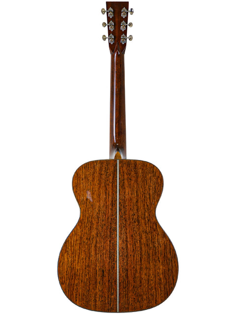  Back view of a Martin Custom Shop 000-42 guitar, showcasing its beautiful Guatemalan rosewood finish from 2019.

