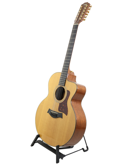 Beautiful 1995 Taylor LKSM Leo Kottke 12-string guitar, showcasing its unique design and rich acoustic sound.
