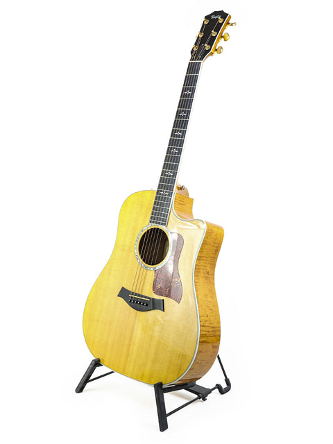 Beautifully crafted Taylor D-18CE acoustic guitar from 2003, USA, perfect for musicians seeking quality and style.
