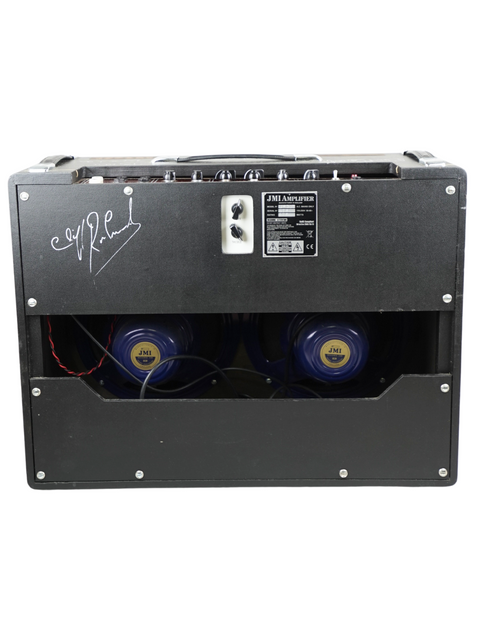 Black amplifier paired with two blue speakers, showcasing the JMI-30 Shadows Anniversary Tour signature from 2009 in the UK.