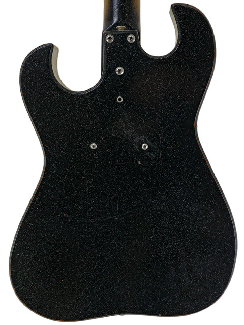 Black electric guitar, Harmony Silvertone 1448 model from the mid-1960s, complete with a stylish black pickguard.