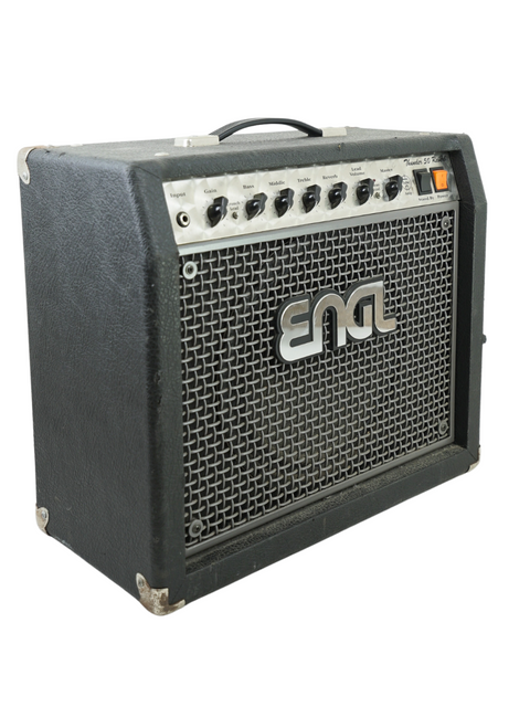Black guitar amplifier with control knobs and logo on the front grille.