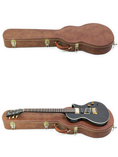 Black guitar case with leather strap and wooden accents, perfect for protecting your Gibson Nighthawk - USA 1999.

