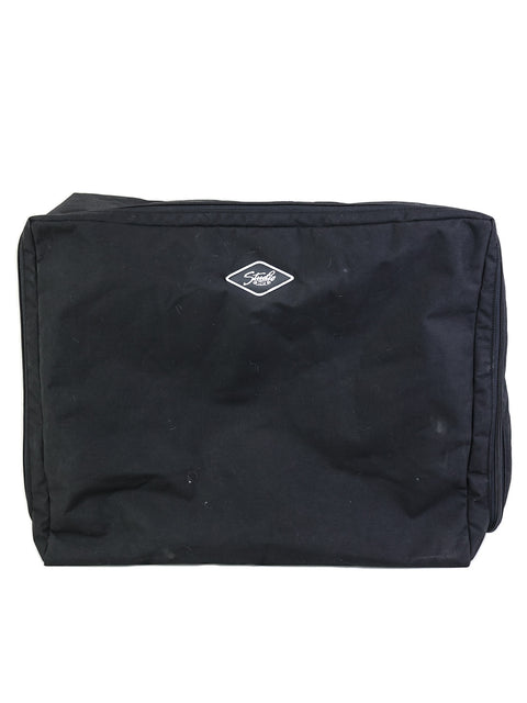 Black toiletry bag with a white logo on a light background.
