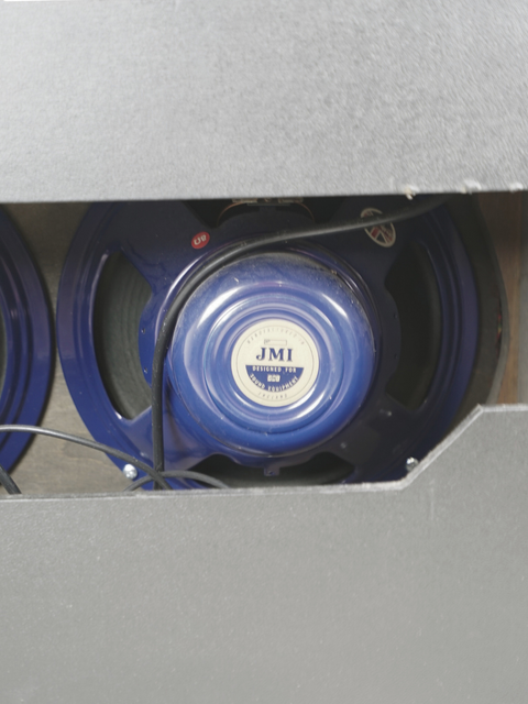 Blue speaker housed in a metal box, highlighting the JMI-30 Shadows Anniversary Tour Signed Amplifier, UK, 2009 edition.