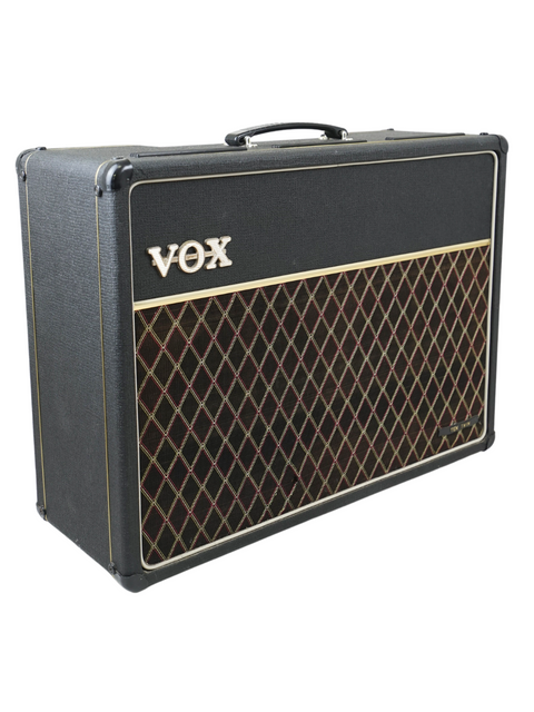 Classic 1964 Vox AC10 Twin amp in black and gold, blending vintage style with iconic British craftsmanship.