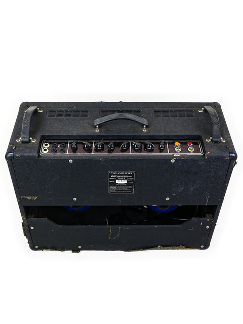 Classic 1994 Vox AC30/6TB combo amp in black, adorned with a blue cover on top for a unique look.