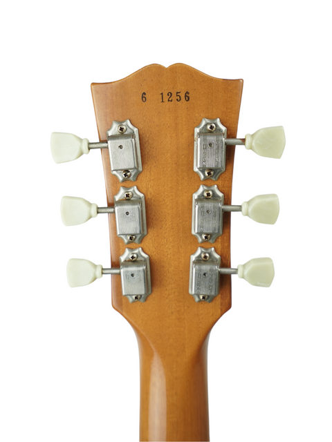 Close-up image showcasing the headstock of a 2011 Gibson Custom Historic VOS LPR-6 1956 Reissue Gold Top acoustic guitar.
