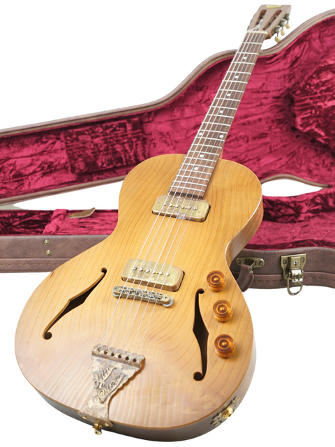 Close-up of B&G Private Build 'Little Sister' guitar resting in its case, showcasing its handcrafted design and vintage aesthetics.