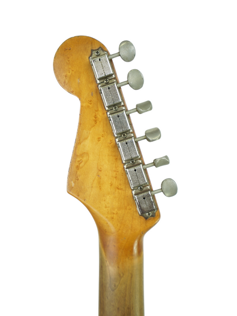 Close-up of a 1963 Fender Stratocaster neck in Fiesta Red, highlighting its classic features and Phil Emmanuel's legacy.