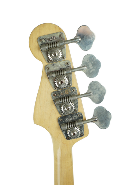 Close-up of a 1972 USA Fender Jazz Bass, focusing on its four strings and timeless vintage appeal.