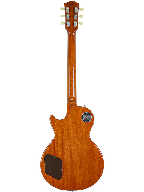 Close-up of a Gibson Custom Shop LPR-7 1957 Les Paul Goldtop Reissue guitar with a beautifully crafted wooden body and neck.