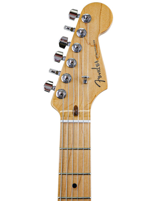 Close-up of a guitar headstock with tuning pegs, isolated on a white background.