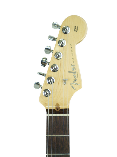 Close-up of a guitar headstock with tuning pegs isolated on white background.