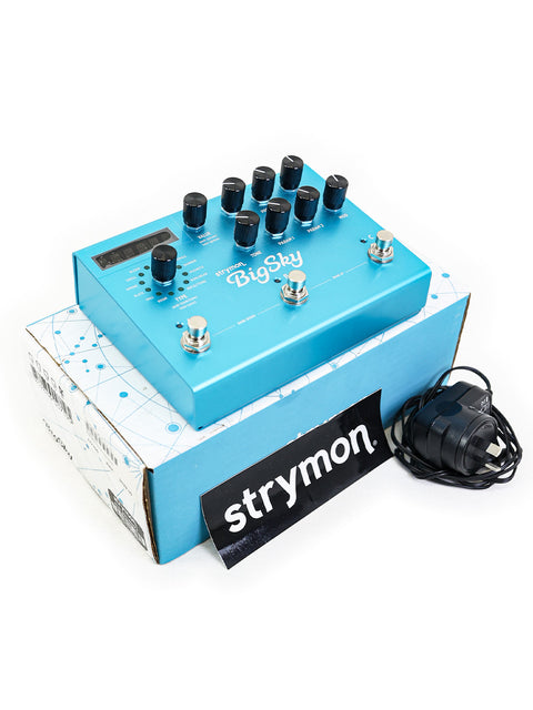 Close-up of the Strymon BigSky Multi Reverb Pedal, featuring a striking blue finish and various control knobs.