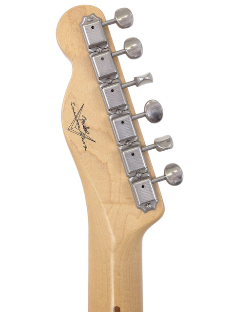 Close-up of the neck on a 2005 Fender Custom Shop Telecaster Thinline, showcasing its sleek design and craftsmanship.