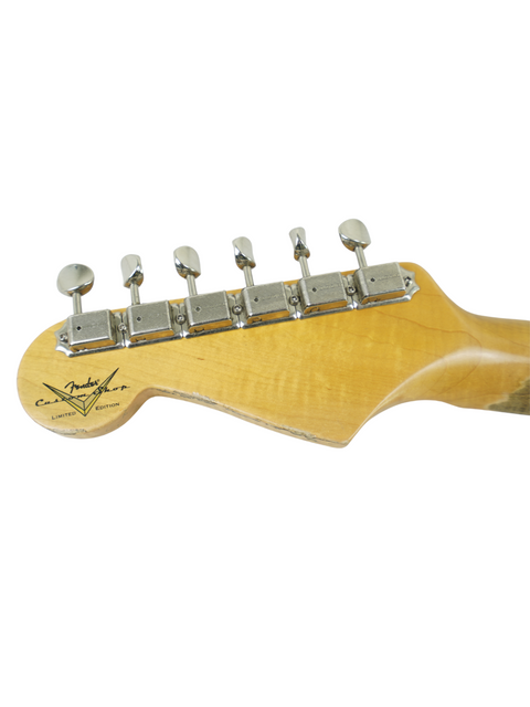 Detailed view of a Fender Custom Shop '56 Relic Stratocaster neck, highlighting its vintage design and quality finish.

