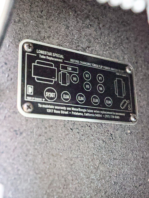 Detailed view of a metal plate featuring a number, part of a 2005 Mesa Boogie Lonestar Special 1x12 Combo Amp.