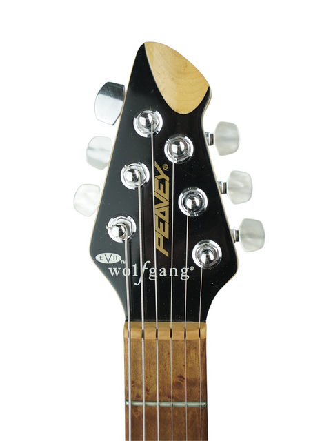 Detailed view of the headstock from a Peavey EVH Wolfgang Standard Hardtail electric guitar, highlighting its craftsmanship.