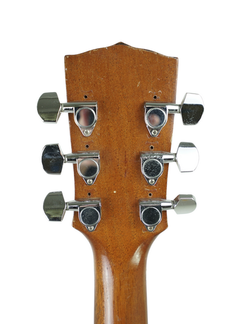 Detailed view of the headstock on a 1940 Vega C-66 acoustic guitar, highlighting its vintage charm and intricate features.