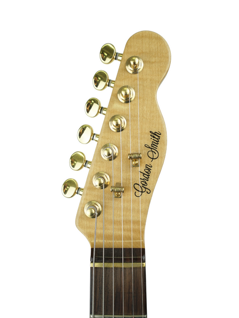 Detailed view of the headstock on a Gordon Smith Classic T electric guitar, highlighting its quality and unique features.