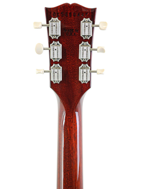 Detailed view of the neck of a 2006 Gibson SG Classic acoustic guitar, highlighting its smooth finish and quality materials.
