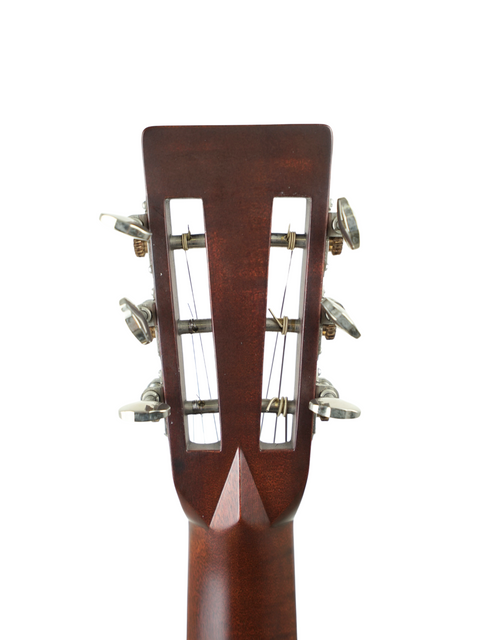 Detailed view of the neck of a 2011 Martin 0-28VS acoustic guitar, highlighting the wood grain and elegant design.