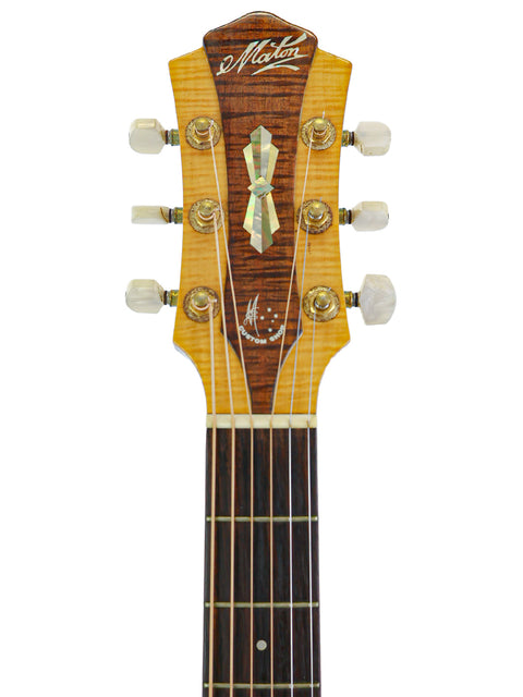 Detailed view of the wooden headstock on a 1997 Matchless Lightning 15 Combo acoustic guitar, highlighting its elegant design.