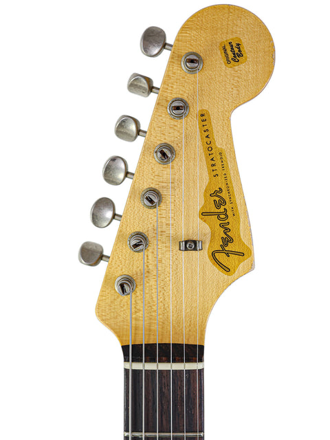 Display of a Fender Yuriy Shishkov Master Built ‘59 Stratocaster Relic, highlighting its unique relic finish and classic features.