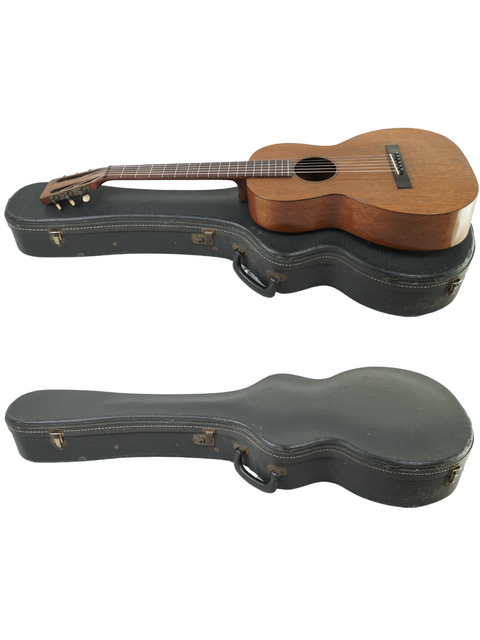 Display of two guitars: a 1928 Martin 2-17 Flat Top in its case and another guitar resting beside it.