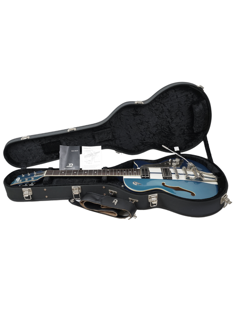 Electric guitar in its case with music sheets.