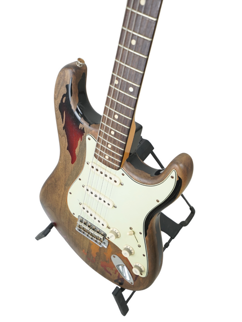 Fender Custom Shop Rory Gallagher Stratocaster, featuring a wooden body and black pickguard, crafted in the USA, 2005.
