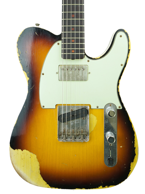 Fender Telecaster guitar with a sunburst finish, showcasing a vintage look from the 2017 Custom Shop Heavy Relic series.
