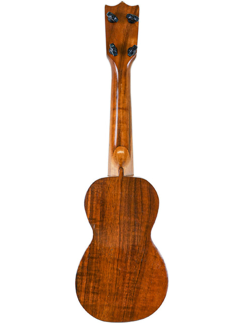 Full back view of the Aloha Tabu Akai ukulele, showing the wooden neck and pristine handcrafted body.

