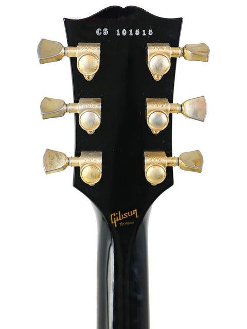 Gibson G-400S in black, highlighting its elegant body and features from the 2010 Custom Shop Les Paul Custom series.