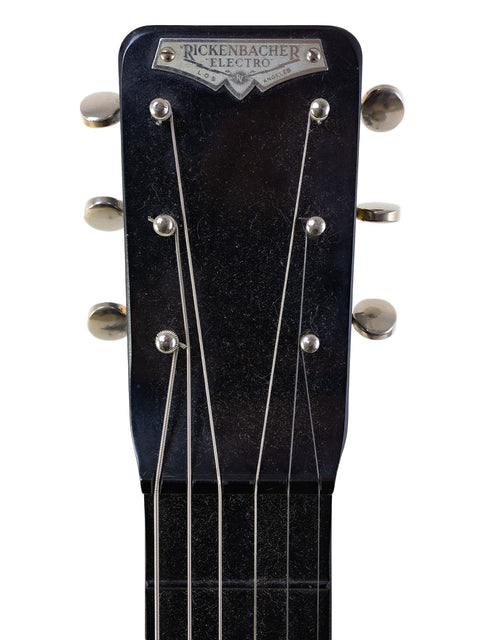 Headstock of a 1930s vintage Rickenbacher Electro B-6 lap steel guitar, highlighting its unique features and craftsmanship.