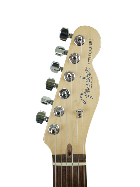 Headstock of a Fender Telecaster guitar with tuning pegs, isolated on white background.