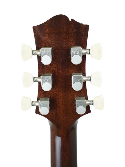 Headstock of a guitar with tuning pegs on a white background.