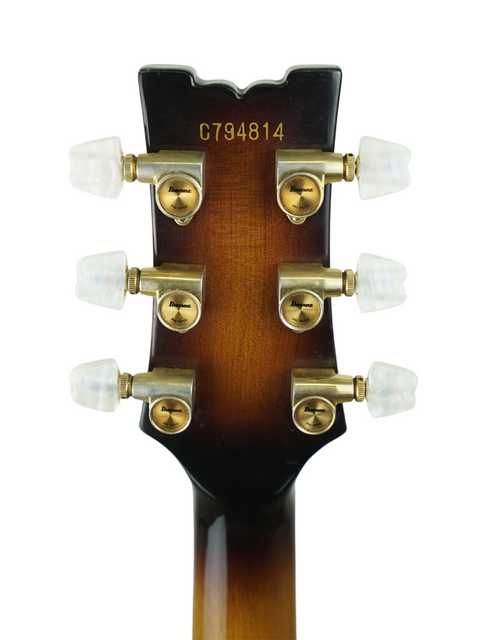 Headstock of a vintage Ibanez Artist 2630 electric guitar from 1979, featuring four control knobs for tone and volume adjustments.