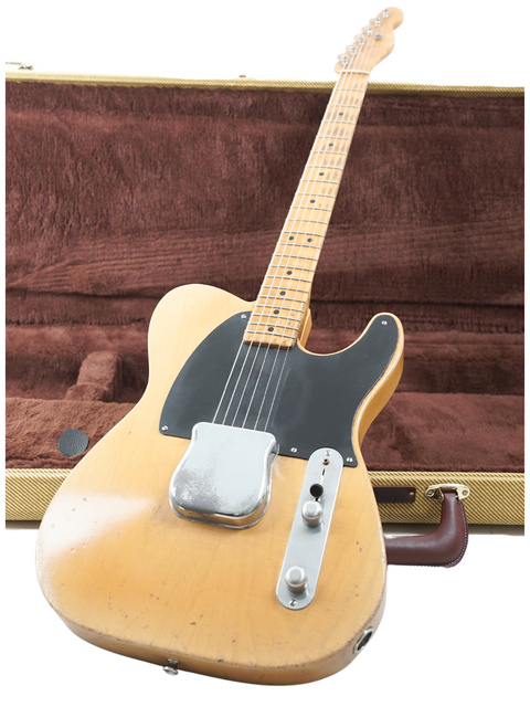 Iconic 1961 Fender Telecaster electric guitar, blending vintage style with exceptional sound quality.
