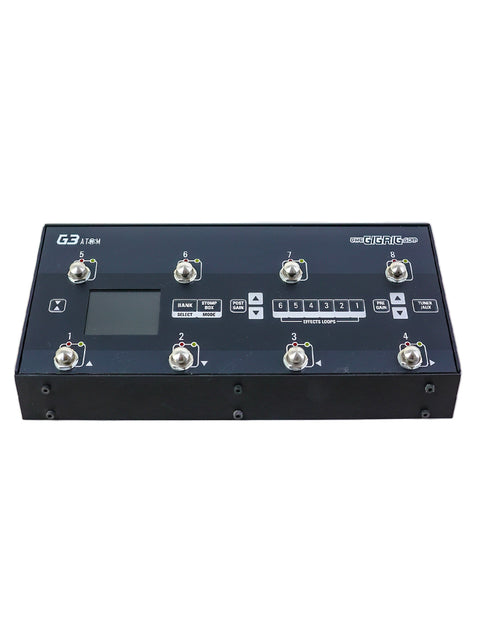 Image of a black and white pedal with a power cord, showcasing The GigRig G3 Atom Switching System, UK 2021 edition.