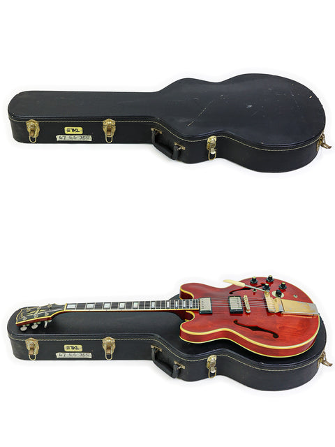 Inside a black case, two guitars are nestled, highlighted by a vibrant red Gibson ES-355 Stereo from 1967.