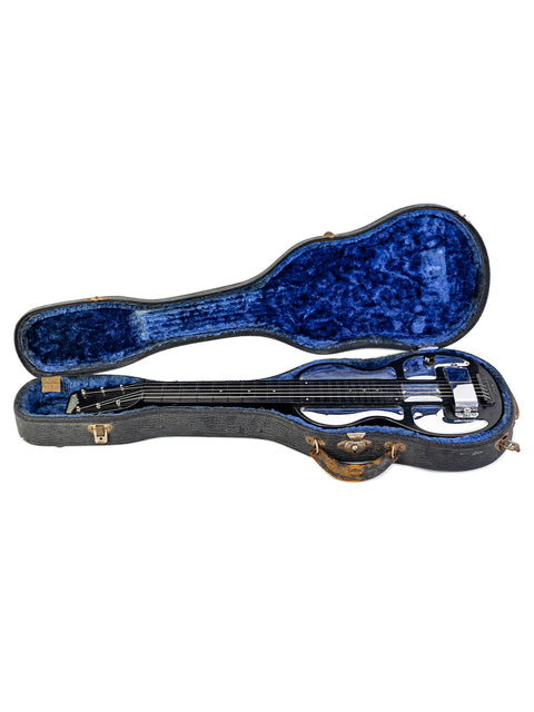 Inside a blue guitar case, a 1930s Rickenbacher Electro B-6 Lap Steel guitar shines in its vintage glory.