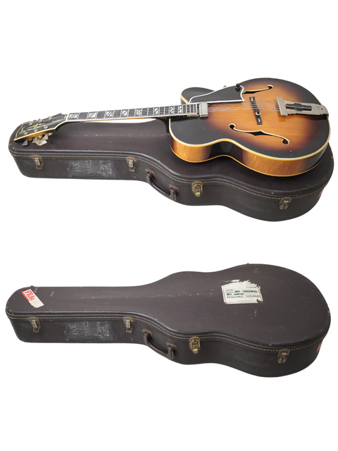  Inside a case, two vintage guitars are presented, one being a 1966 Gibson Johnny Smith, reflecting timeless musical elegance.