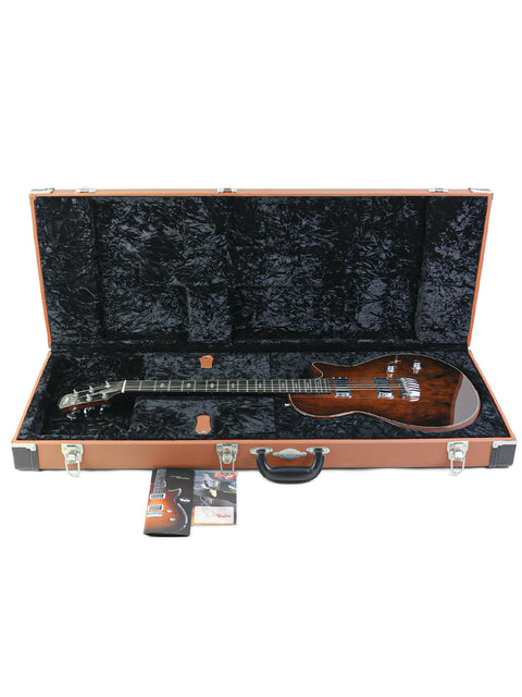 Inside a stylish guitar case lies a 2007 Taylor Solid Body guitar, a perfect blend of elegance and sound.