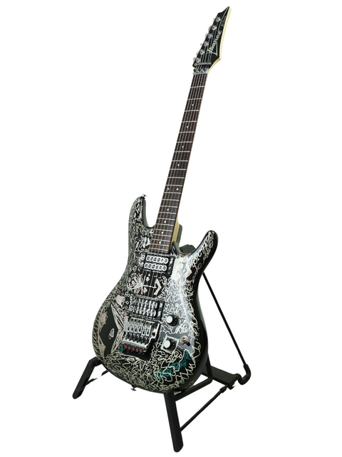 Limited edition Ibanez guitar in black and silver, featuring Joe Satriani's Black Dog design, a rare collectible from Japan 2008.
